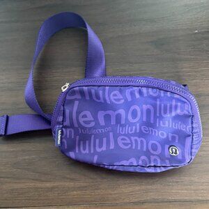 Used- Lululemon Purple Wordmark Belt Bag 1L